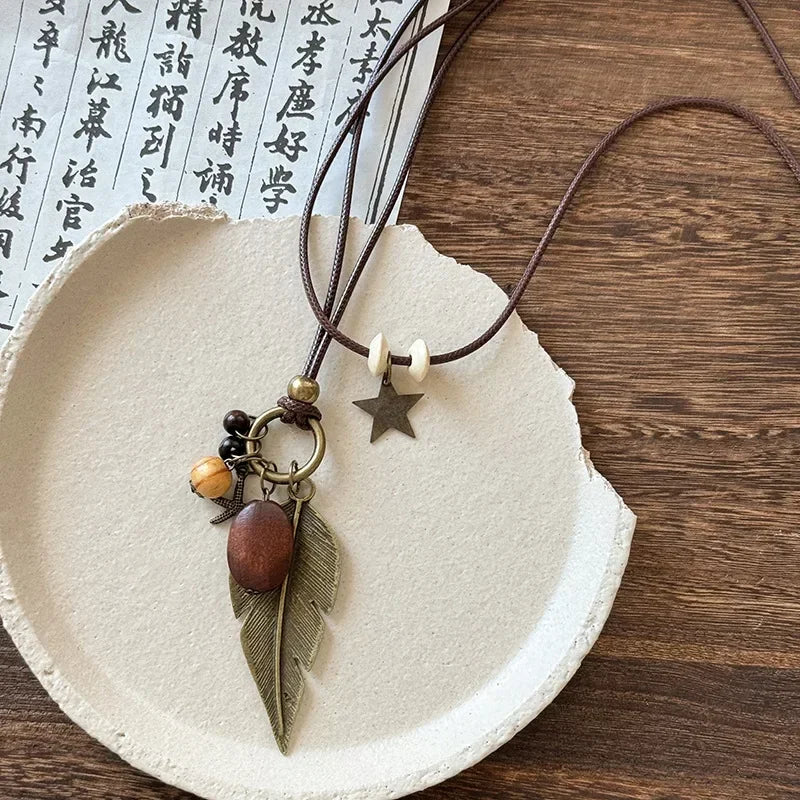 FBA Star Feather Leather Pendant Necklace | Retro Art Jewelry